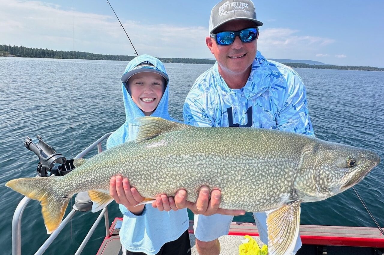 Young Angler Catches Huge Lake Trout on Flathead Lake